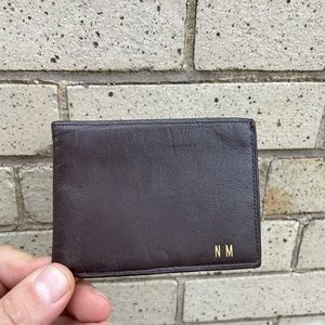 Antique monogrammed coach hide leather wallet, dark brown